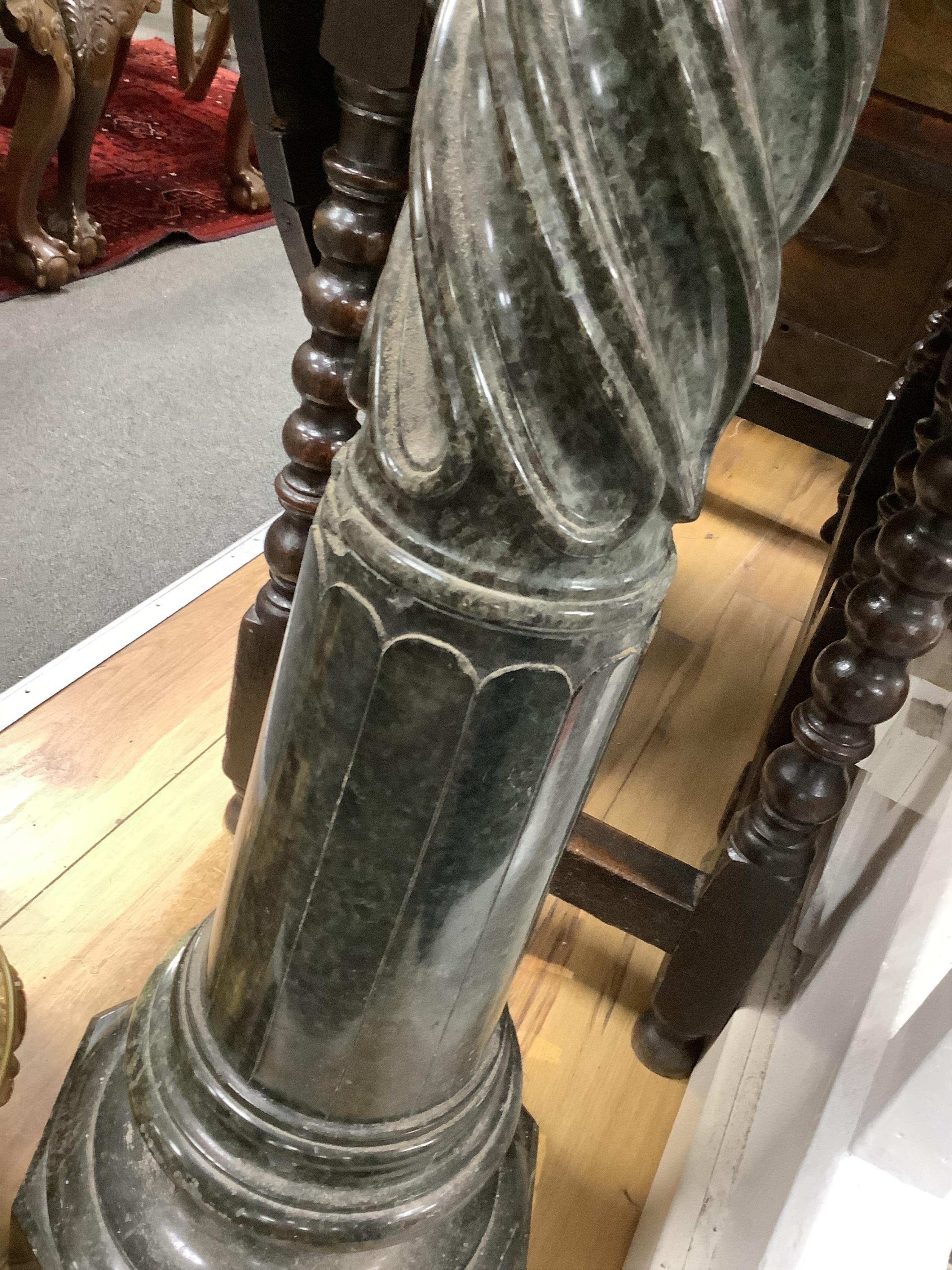 A Victorian green serpentine pedestal with spiral fluted column on octagonal plinth, 110cm high. Condition - fair